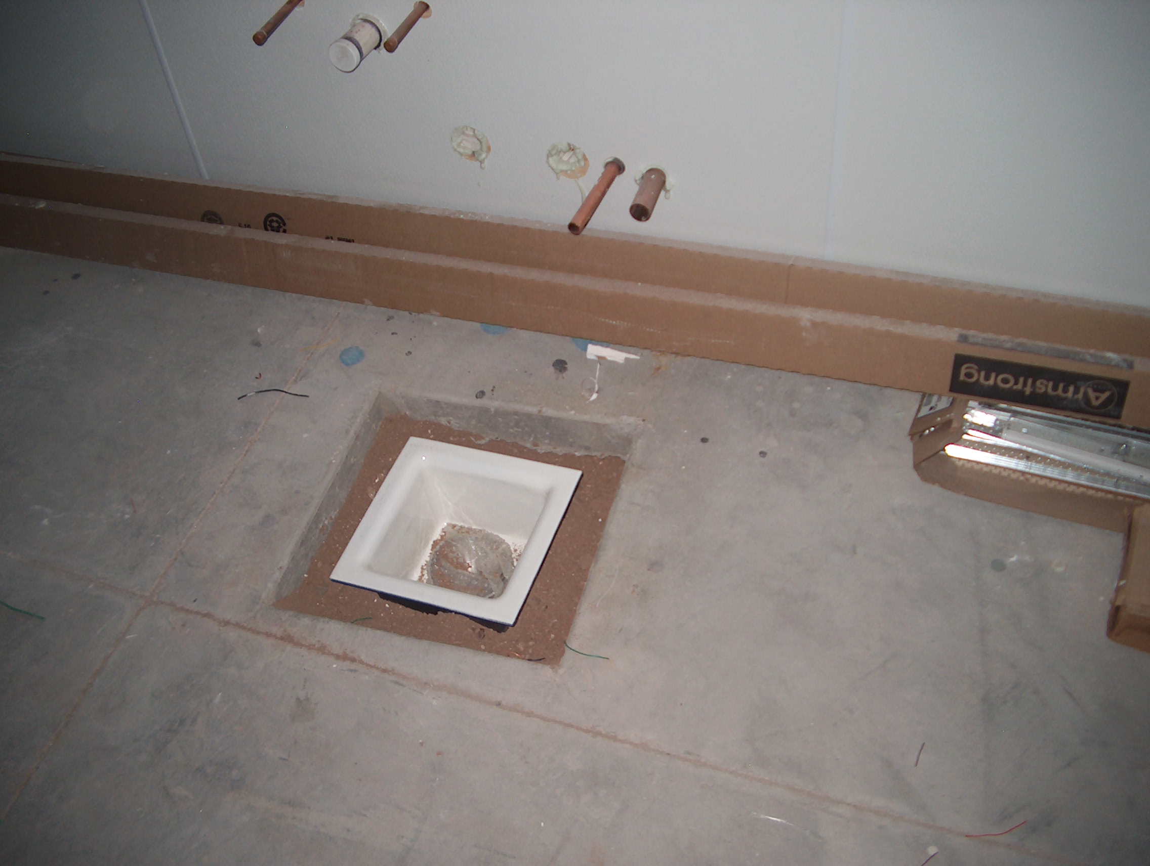 one of a number of floor sinks- this ones for the ice machine